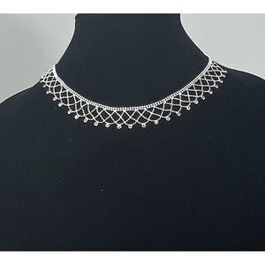 NWOT Givenchy Silver plate lace necklace with pink rhinestones.